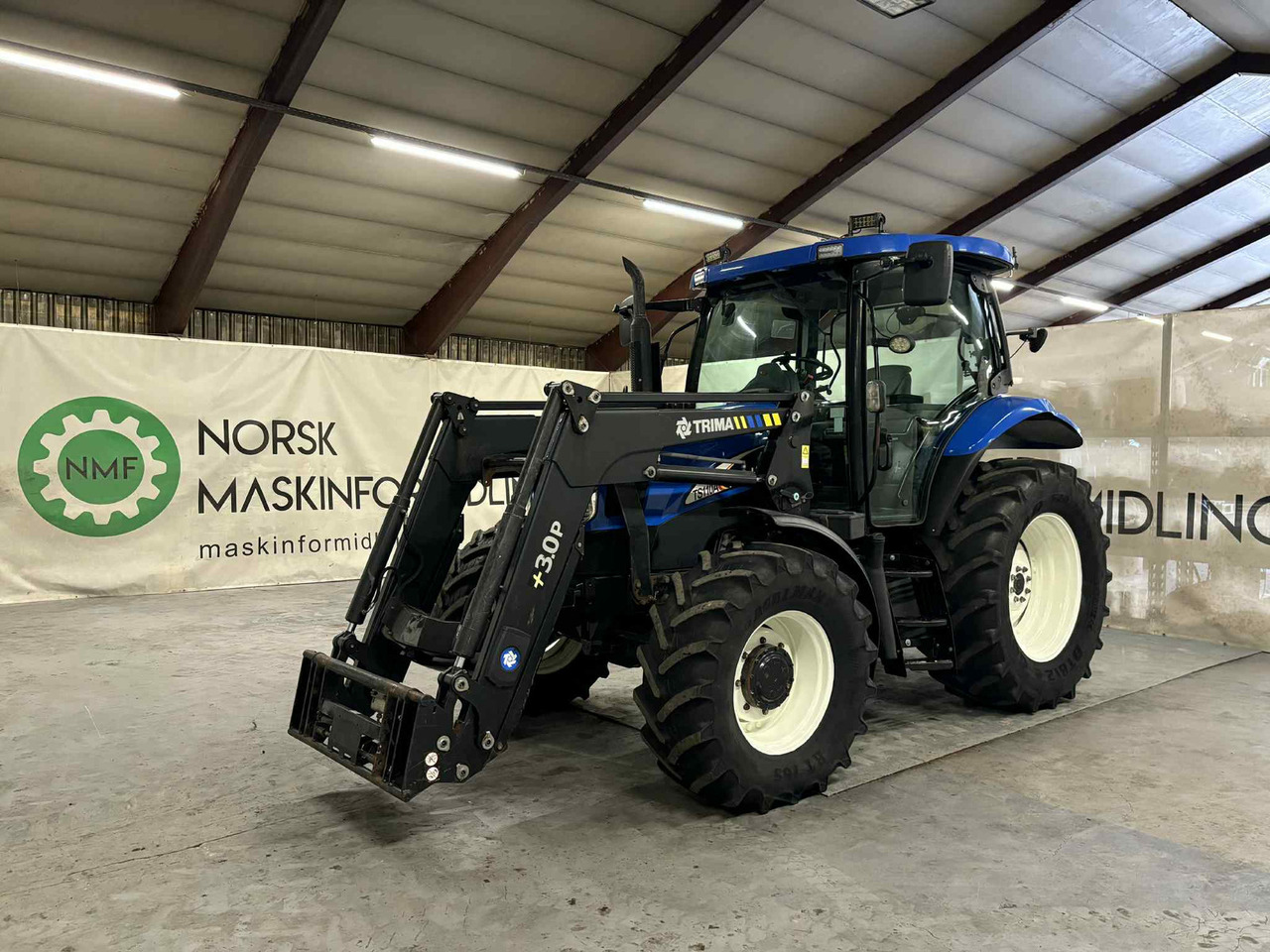 New Holland TS110A - Tractor: foto 1 New Holland TS110A - Tractor: foto 1