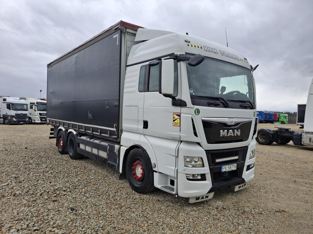 Camión lona MAN TGX SOLÓWKA: foto 1