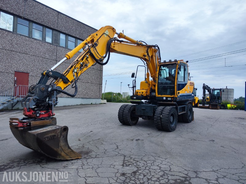 2016 Hyundai R140W-9 hjulgraver med leddet bom, tiltrotator og pusseskuff - Excavadora: foto 2 2016 Hyundai R140W-9 hjulgraver med leddet bom, tiltrotator og pusseskuff - Excavadora: foto 2