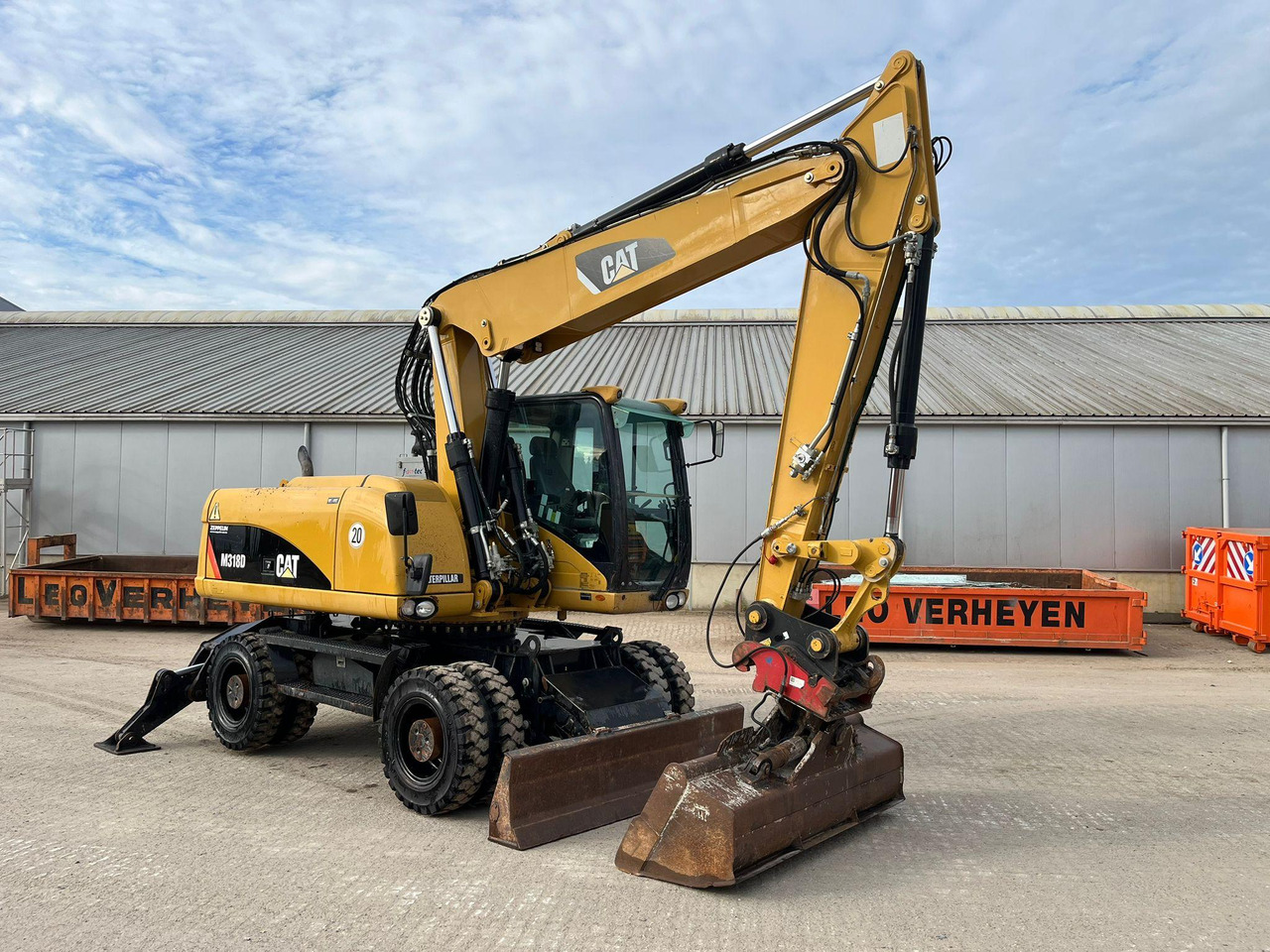 Caterpillar M318D - Excavadora de ruedas: foto 1 Caterpillar M318D - Excavadora de ruedas: foto 1