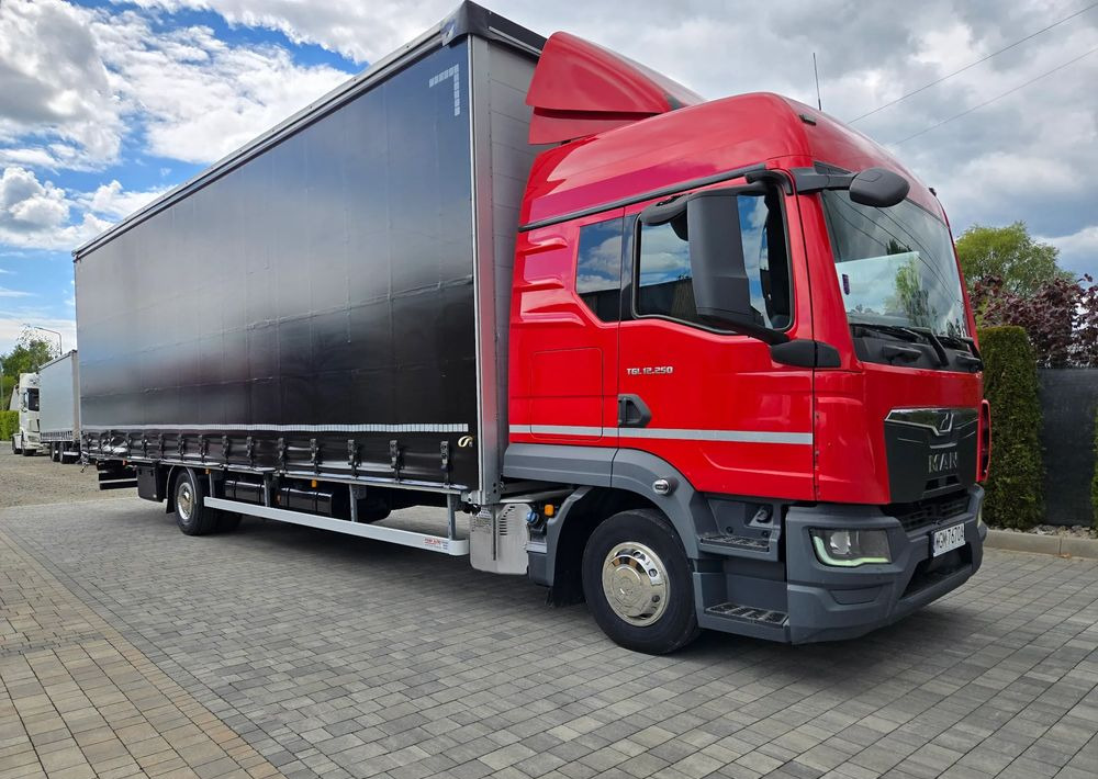 MAN TGL 12.250 - Camión lona: foto 2 MAN TGL 12.250 - Camión lona: foto 2