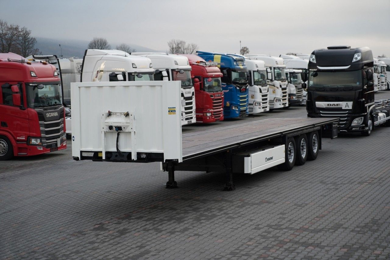 Krone NACZEPA PLATFORMA / OŚ PODNOSZONA / KOSZ NA PAL - Semirremolque plataforma/ Caja abierta: foto 1 Krone NACZEPA PLATFORMA / OŚ PODNOSZONA / KOSZ NA PAL - Semirremolque plataforma/ Caja abierta: foto 1