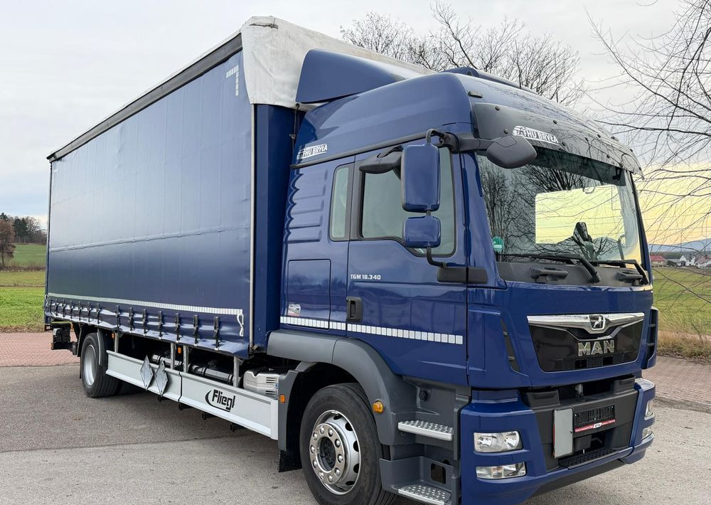 MAN TGM 18.340 / FIRANKA / LIFT / SPROWADZONY / KLIMA POSTOJOWA / 2017 / 9700 ŁADOWNOŚĆ / AUTOMAT / 18 PALET / E6 / WINDA / - Camión lona: foto 1 MAN TGM 18.340 / FIRANKA / LIFT / SPROWADZONY / KLIMA POSTOJOWA / 2017 / 9700 ŁADOWNOŚĆ / AUTOMAT / 18 PALET / E6 / WINDA / - Camión lona: foto 1