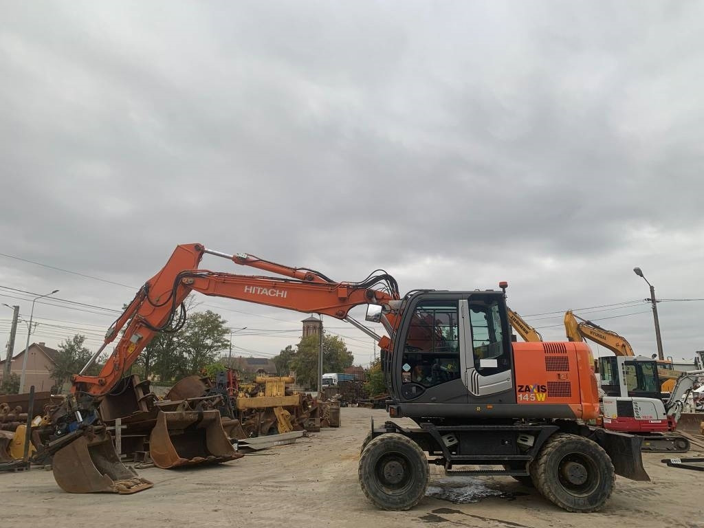 Hitachi ZX 145 W-3+SMP Rototilt  - Excavadora de ruedas: foto 2 Hitachi ZX 145 W-3+SMP Rototilt  - Excavadora de ruedas: foto 2