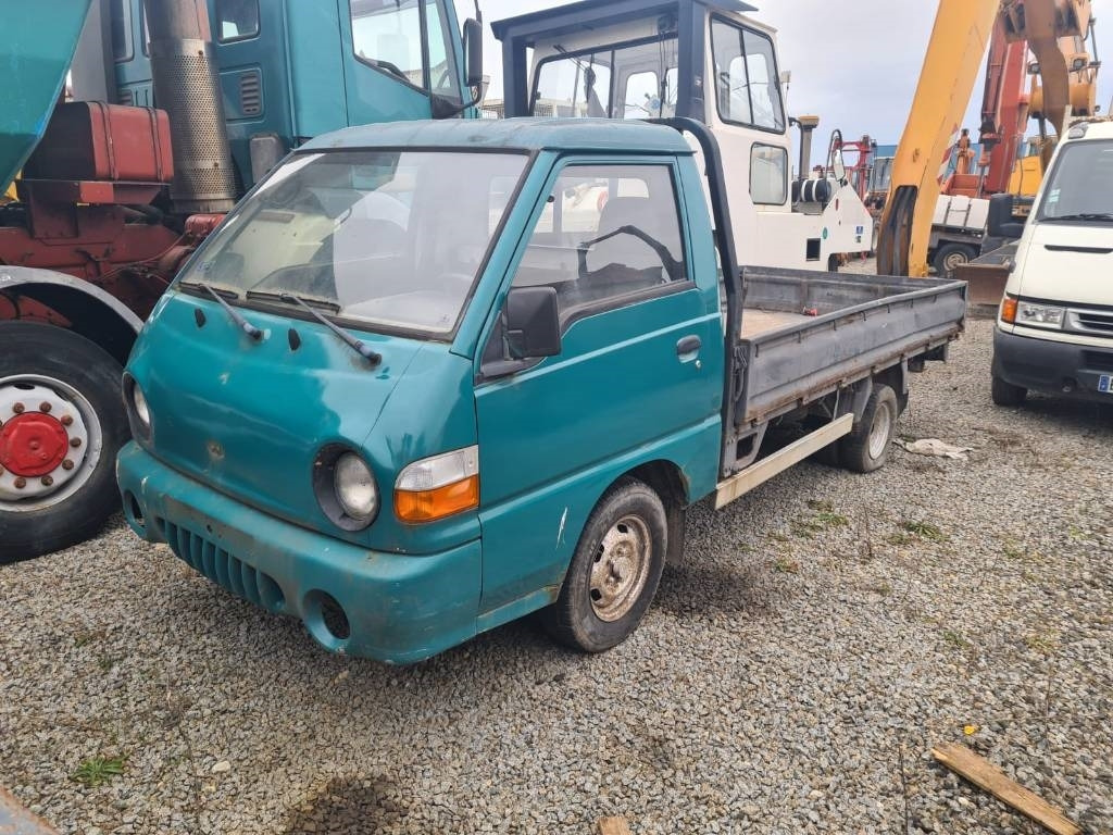 Hyundai H 100 - Camión caja abierta: foto 1 Hyundai H 100 - Camión caja abierta: foto 1