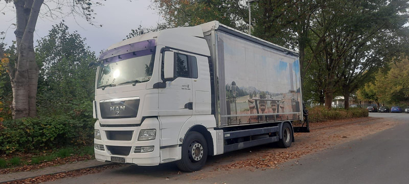 MAN TGX 18.360PS 4x2 G.Haus Kran+Funk - Camión lona, Camión grúa: foto 1 MAN TGX 18.360PS 4x2 G.Haus Kran+Funk - Camión lona, Camión grúa: foto 1