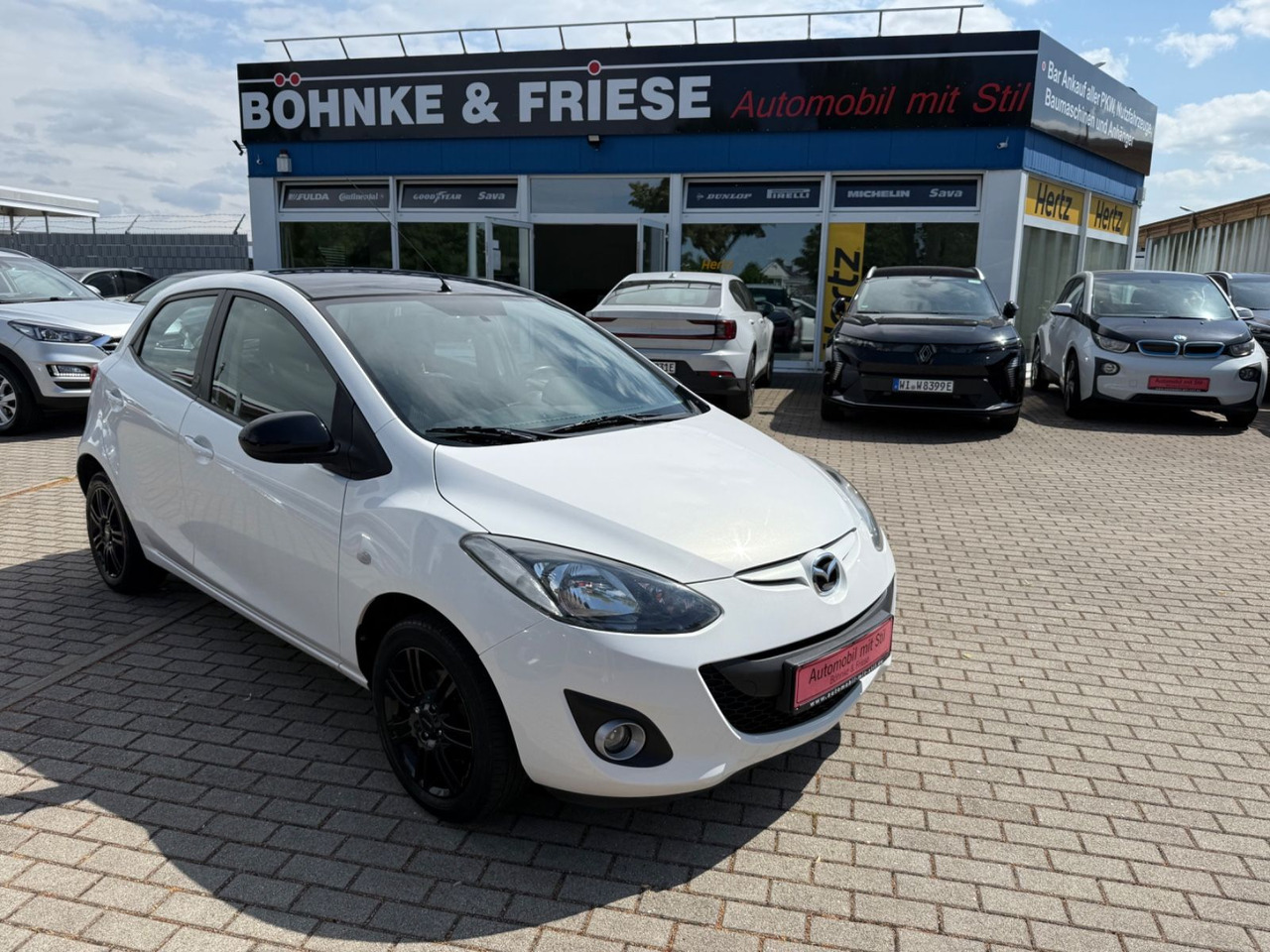 Mazda 2 Lim. 1.3 Origami 5 TÜER KLIMA SHZ TÜV NEU - Coche: foto 1 Mazda 2 Lim. 1.3 Origami 5 TÜER KLIMA SHZ TÜV NEU - Coche: foto 1