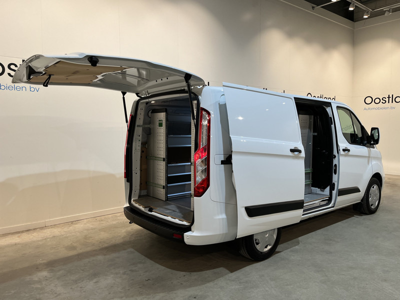 Ford Transit Custom 300 2.0 TDCI L1H1 Trend 130 PK / Servicebus / Bott Inrichting / Euro 6 / Schuifdeur L + R / Airco / CarPlay / Klep / PDC / Navigatie / 3-Zits / BPM VRIJ !! - Furgoneta pequeña: foto 2 Ford Transit Custom 300 2.0 TDCI L1H1 Trend 130 PK / Servicebus / Bott Inrichting / Euro 6 / Schuifdeur L + R / Airco / CarPlay / Klep / PDC / Navigatie / 3-Zits / BPM VRIJ !! - Furgoneta pequeña: foto 2