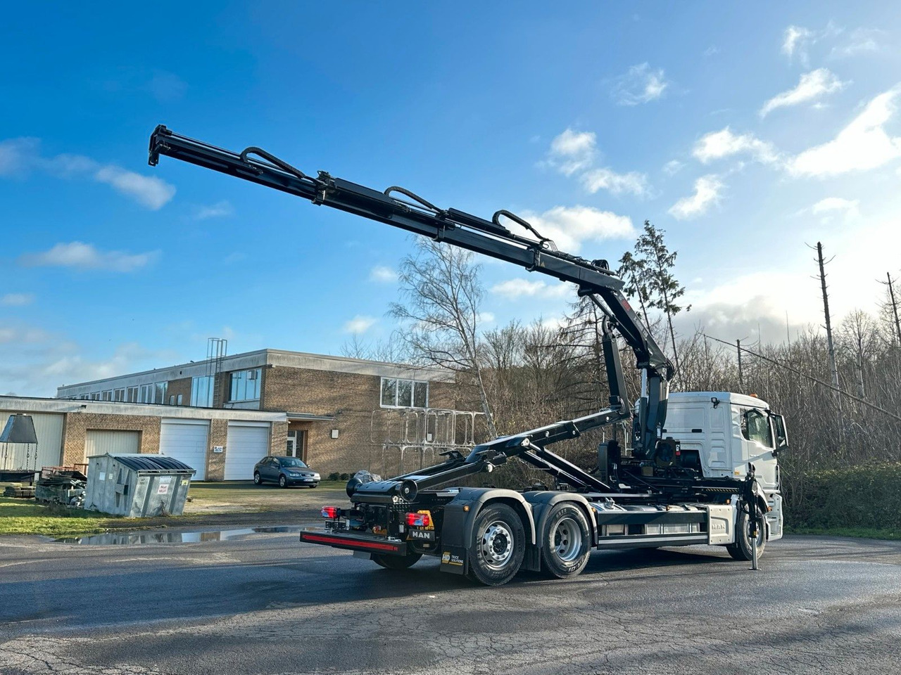 MAN TGS 26.470 6x2 Abrollkipper + Kran Hiab 138-3 - Camión multibasculante, Camión grúa: foto 5 MAN TGS 26.470 6x2 Abrollkipper + Kran Hiab 138-3 - Camión multibasculante, Camión grúa: foto 5