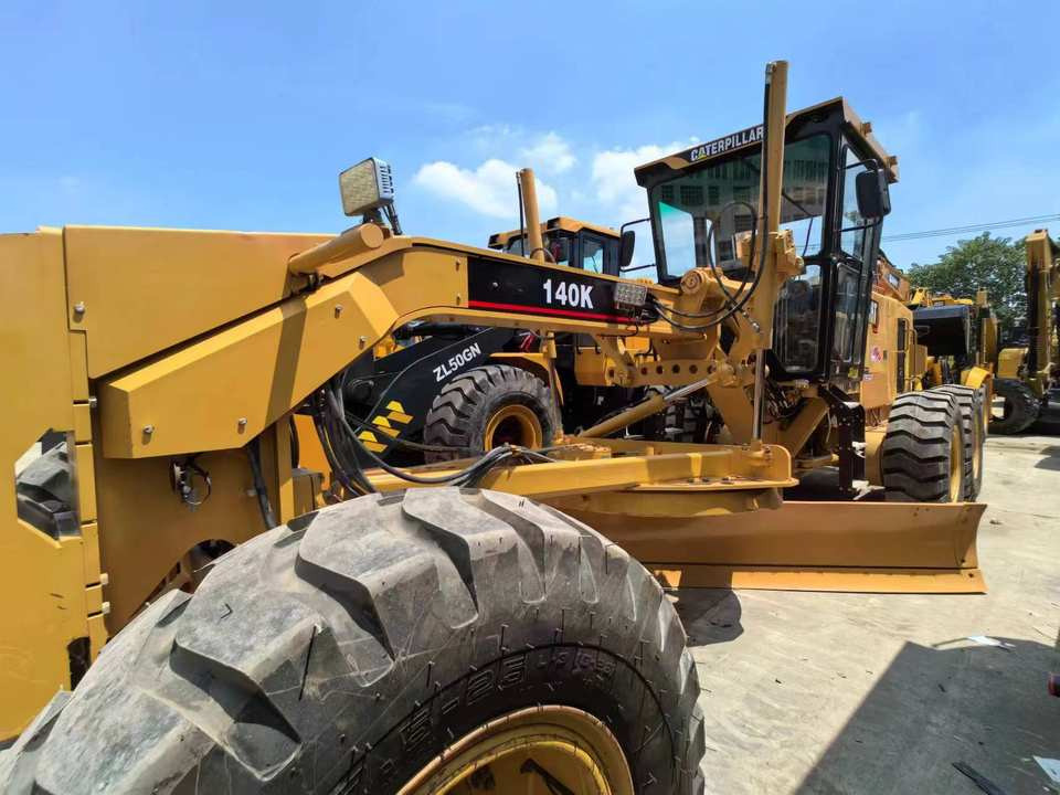 Second Hand Used Construction Machinery CAT 140K 15 Ton Grader for Sale 1000H From Shanghai Japanese Brand Good Condition - Grader: foto 2 Second Hand Used Construction Machinery CAT 140K 15 Ton Grader for Sale 1000H From Shanghai Japanese Brand Good Condition - Grader: foto 2