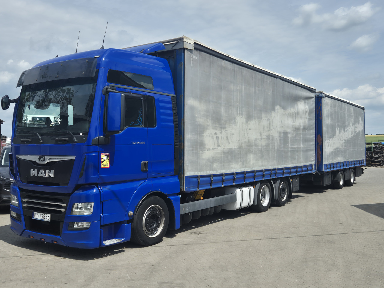 MAN tgx 24,500 - Camión lona: foto 2 MAN tgx 24,500 - Camión lona: foto 2