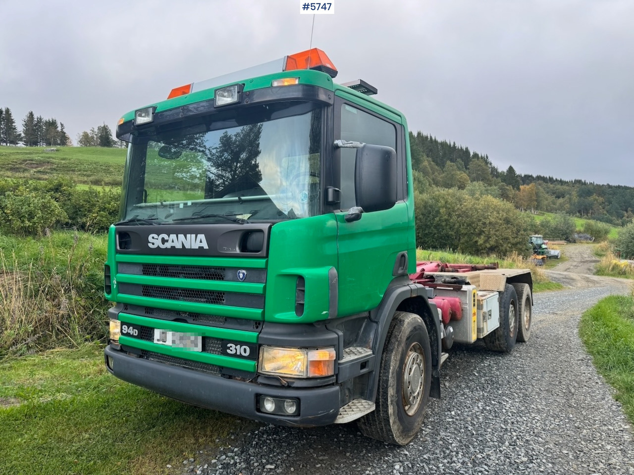1998 Scania 94D 310 Hook‑truck - Camión multibasculante: foto 1 1998 Scania 94D 310 Hook‑truck - Camión multibasculante: foto 1