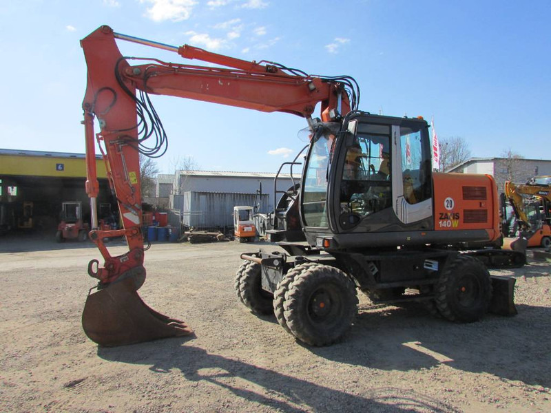 Hitachi ZX 140 W-3 Mobilbagger 43.000 EUR / Klima - Excavadora de ruedas: foto 1 Hitachi ZX 140 W-3 Mobilbagger 43.000 EUR / Klima - Excavadora de ruedas: foto 1