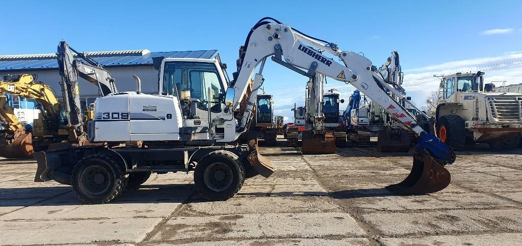 Liebherr A 309 Litronic - Excavadora de ruedas: foto 4 Liebherr A 309 Litronic - Excavadora de ruedas: foto 4
