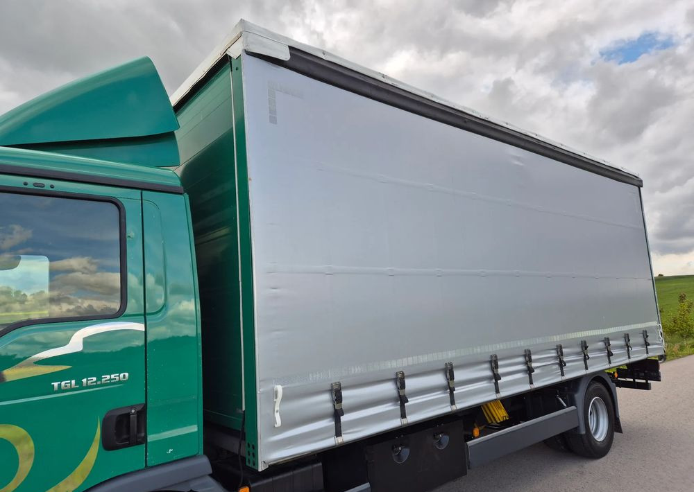 MAN TGL 12.250 6.2m AUTOMAT KLIMA z Niemiec ESP nowe opony EURO 6 / 4.75 rozstaw / zawiesie na wózek widłowy / TOP STAN / okazja nauka jazdy MOŻLIWOŚĆ DOSTOSOWANIA 12t - Camión lona: foto 4 MAN TGL 12.250 6.2m AUTOMAT KLIMA z Niemiec ESP nowe opony EURO 6 / 4.75 rozstaw / zawiesie na wózek widłowy / TOP STAN / okazja nauka jazdy MOŻLIWOŚĆ DOSTOSOWANIA 12t - Camión lona: foto 4