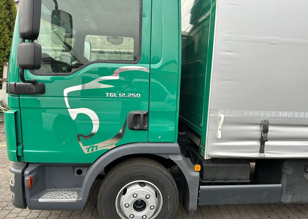 MAN TGL 12.250 6.2m AUTOMAT KLIMA z Niemiec ESP nowe opony EURO 6 / 4.75 rozstaw / zawiesie na wózek widłowy / TOP STAN / okazja nauka jazdy MOŻLIWOŚĆ DOSTOSOWANIA 12t - Camión lona: foto 5 MAN TGL 12.250 6.2m AUTOMAT KLIMA z Niemiec ESP nowe opony EURO 6 / 4.75 rozstaw / zawiesie na wózek widłowy / TOP STAN / okazja nauka jazdy MOŻLIWOŚĆ DOSTOSOWANIA 12t - Camión lona: foto 5
