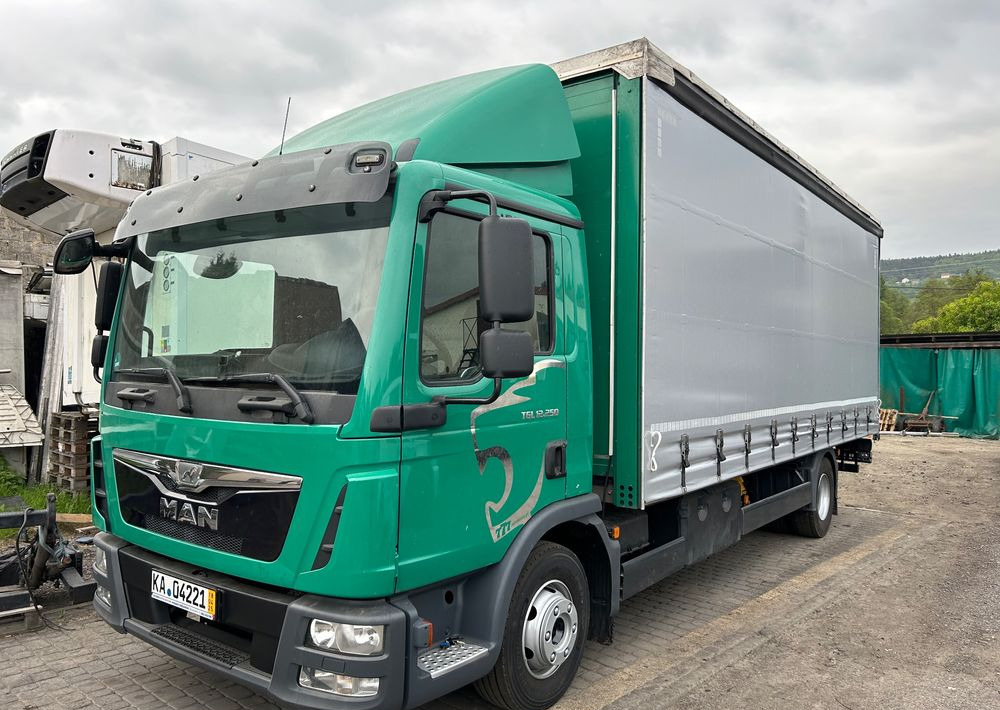 MAN TGL 12.250 6.2m AUTOMAT KLIMA z Niemiec ESP nowe opony EURO 6 / 4.75 rozstaw / zawiesie na wózek widłowy / TOP STAN / okazja nauka jazdy MOŻLIWOŚĆ DOSTOSOWANIA 12t - Camión lona: foto 1 MAN TGL 12.250 6.2m AUTOMAT KLIMA z Niemiec ESP nowe opony EURO 6 / 4.75 rozstaw / zawiesie na wózek widłowy / TOP STAN / okazja nauka jazdy MOŻLIWOŚĆ DOSTOSOWANIA 12t - Camión lona: foto 1