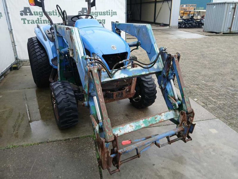 New Holland TC 40 - Tractor: foto 4 New Holland TC 40 - Tractor: foto 4