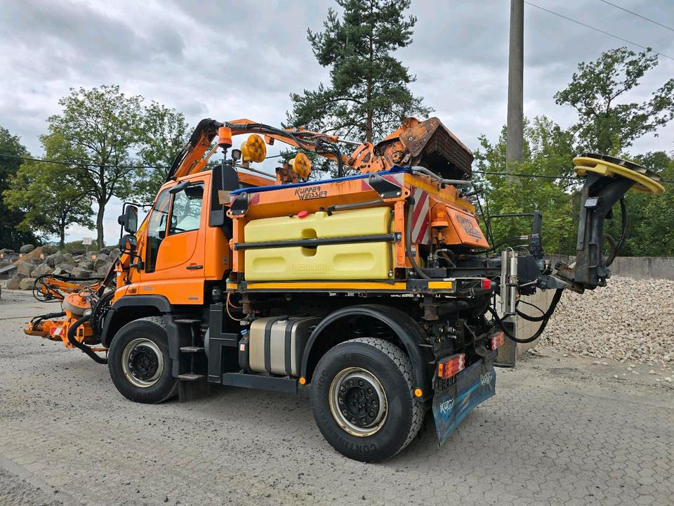 Unimog U400 2013 405/10 405/12 NKS-Z-UGN-43K Bluetec 5 Mercedes-Benz UGE UGN Mulag MKM700 Mähausleger Böschungsmäher Böschungsmulcher Küpper-Weisser IMS Salzstreuer - Máquina quitanieve: foto 3 Unimog U400 2013 405/10 405/12 NKS-Z-UGN-43K Bluetec 5 Mercedes-Benz UGE UGN Mulag MKM700 Mähausleger Böschungsmäher Böschungsmulcher Küpper-Weisser IMS Salzstreuer - Máquina quitanieve: foto 3