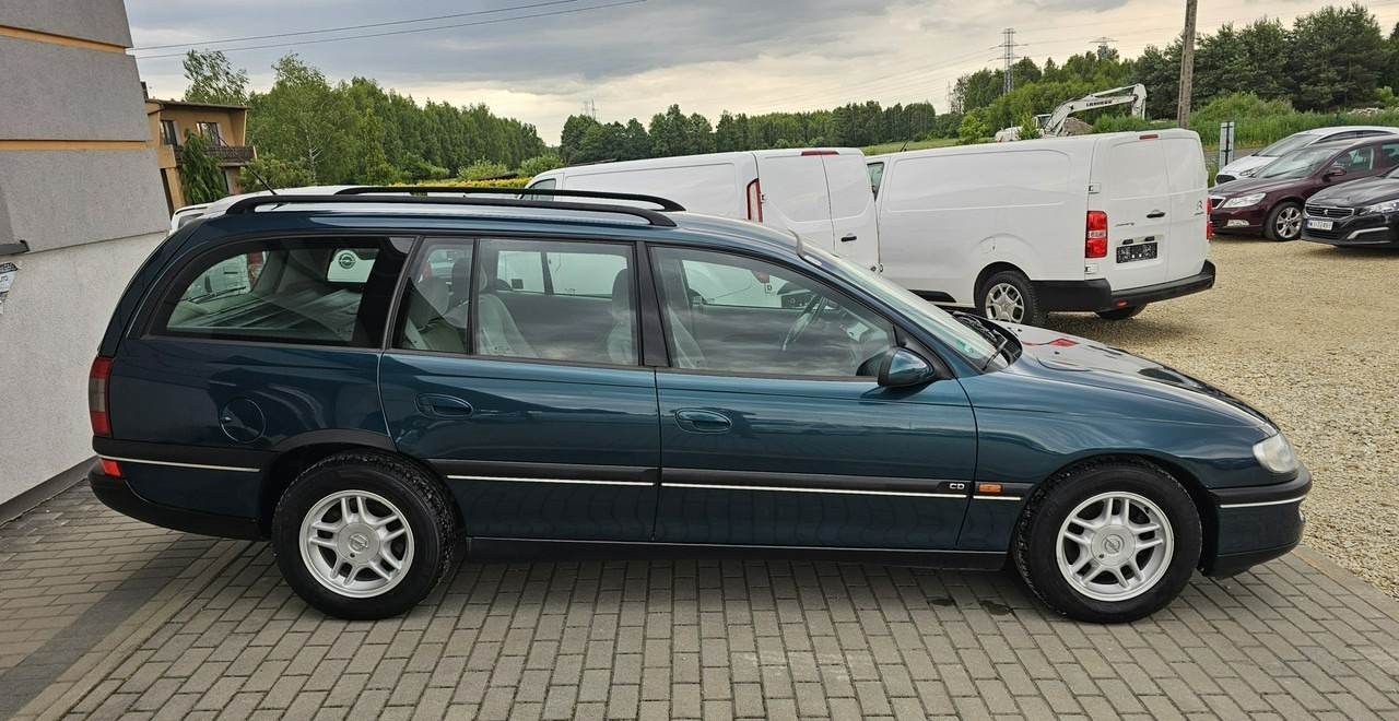 Opel Omega B 2,5 v6 *automat* napęd tył *welury* - Coche familiar: foto 5 Opel Omega B 2,5 v6 *automat* napęd tył *welury* - Coche familiar: foto 5