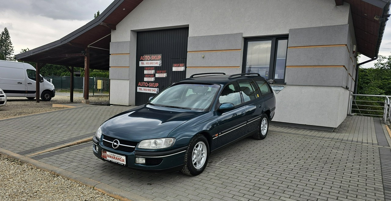 Opel Omega B 2,5 v6 *automat* napęd tył *welury* - Coche familiar: foto 3 Opel Omega B 2,5 v6 *automat* napęd tył *welury* - Coche familiar: foto 3