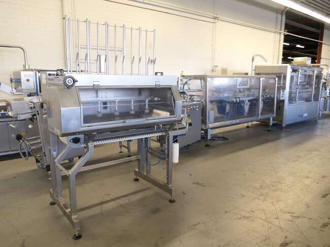 Tramper filling- and traysealing line GMD99-2 - Máquina de embalaje: foto 1 Tramper filling- and traysealing line GMD99-2 - Máquina de embalaje: foto 1