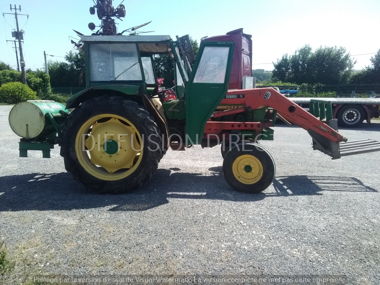 JOHN DEERE TRACTEUR 1120 - Tractor: foto 2 JOHN DEERE TRACTEUR 1120 - Tractor: foto 2