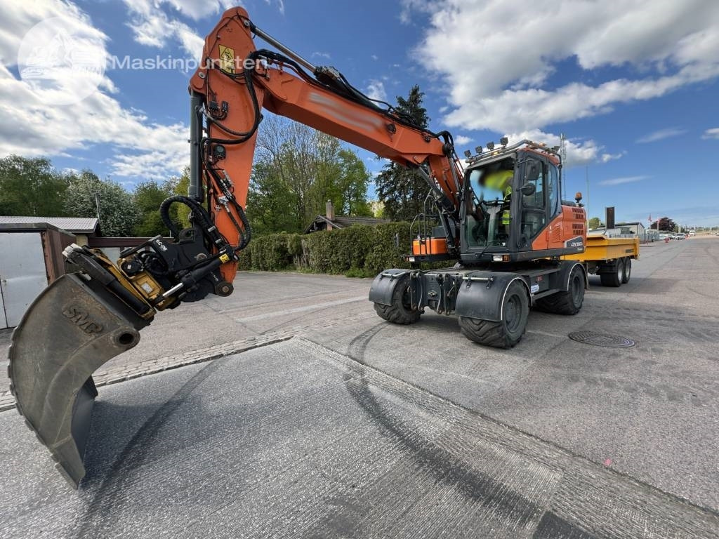 Doosan DX 160 W - Excavadora de ruedas: foto 1 Doosan DX 160 W - Excavadora de ruedas: foto 1