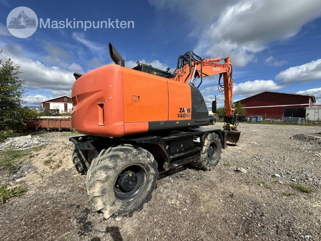 Hitachi ZX 140 W-5B - Excavadora de ruedas: foto 5 Hitachi ZX 140 W-5B - Excavadora de ruedas: foto 5