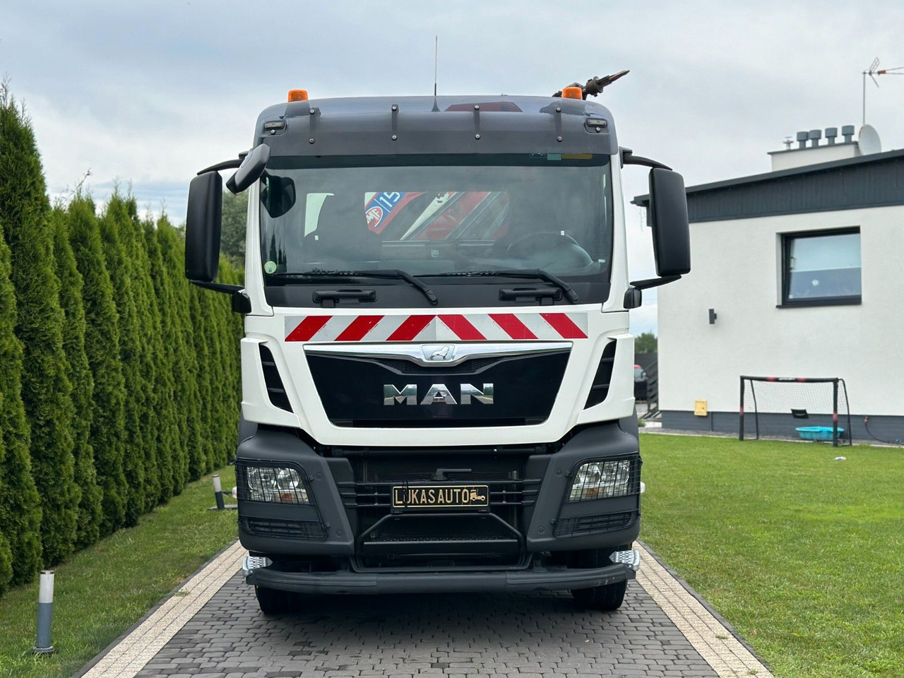 MAN TGS 440 / 8x4 /CRANE HMF 1530/ TIPPER - Camión grúa: foto 3 MAN TGS 440 / 8x4 /CRANE HMF 1530/ TIPPER - Camión grúa: foto 3