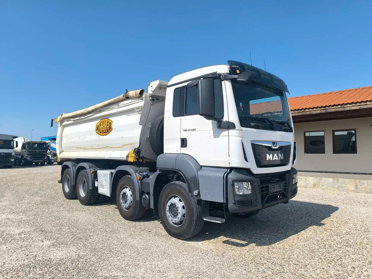MAN TGS 41.420 MEILLER KIPPER - Camión portacontenedor de cadenas: foto 1 MAN TGS 41.420 MEILLER KIPPER - Camión portacontenedor de cadenas: foto 1