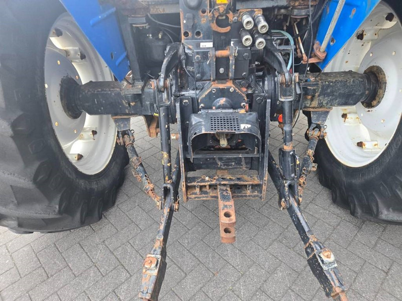Tractor New Holland TL 90 A: foto 7 Tractor New Holland TL 90 A: foto 7