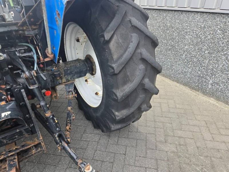 Tractor New Holland TL 90 A: foto 8 Tractor New Holland TL 90 A: foto 8