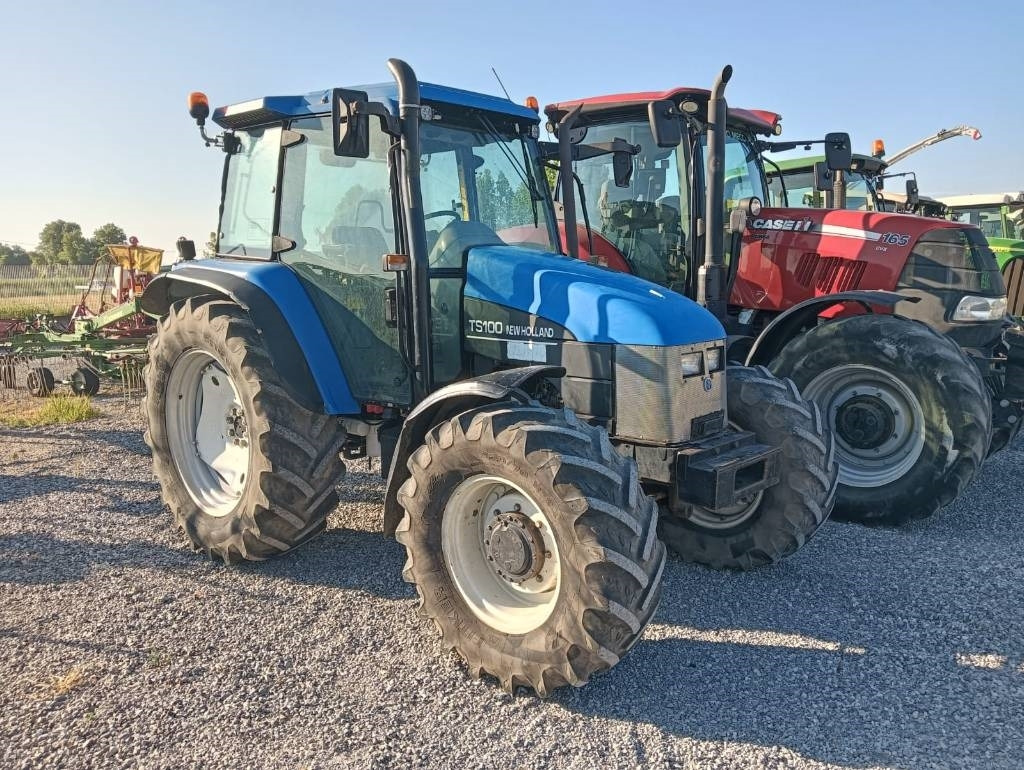 New Holland TS 100 - Tractor: foto 1 New Holland TS 100 - Tractor: foto 1