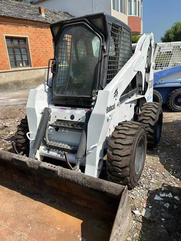 High Quality Mini Construction Machine Used Bobcat Skid Steer Loader S300 in Stock for Sale Bobcat Loader With Low Price - Maquinaria de construcción: foto 1 High Quality Mini Construction Machine Used Bobcat Skid Steer Loader S300 in Stock for Sale Bobcat Loader With Low Price - Maquinaria de construcción: foto 1