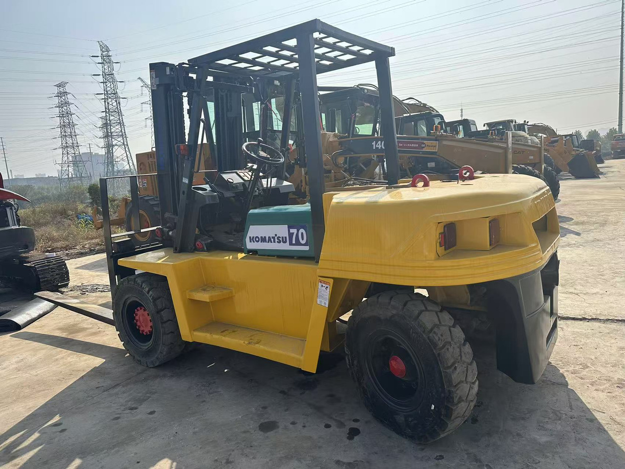 KOMATSU 7-ton - Carretilla elevadora diésel: foto 1 KOMATSU 7-ton - Carretilla elevadora diésel: foto 1