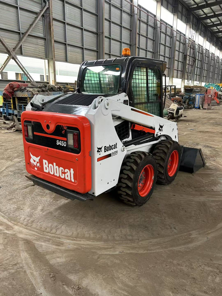 BOBCAT Skid Steer Loader S450 - Maquinaria de construcción: foto 1 BOBCAT Skid Steer Loader S450 - Maquinaria de construcción: foto 1