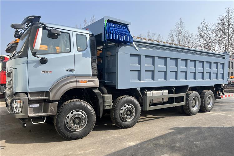SINOTRUK Used Howo NX 380 Dump Truck with Weichai Engine In Angola - Camión volquete: foto 1 SINOTRUK Used Howo NX 380 Dump Truck with Weichai Engine In Angola - Camión volquete: foto 1