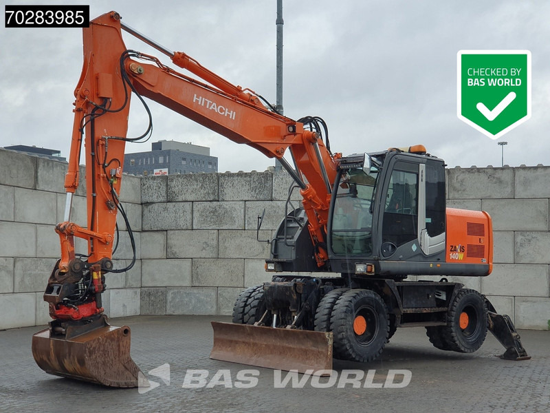 Hitachi ZX140W -3 OUTRIGGERS - ROTOTILT - Excavadora de ruedas: foto 1 Hitachi ZX140W -3 OUTRIGGERS - ROTOTILT - Excavadora de ruedas: foto 1