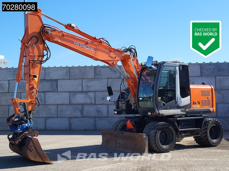 Hitachi ZX140W -3 - Excavadora de ruedas: foto 1 Hitachi ZX140W -3 - Excavadora de ruedas: foto 1