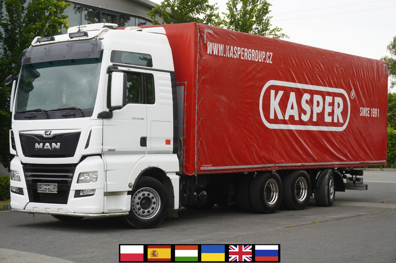 MAN MAN TGX 35.580 E6 8x4 /4 / 23 EPAL tarp superstructure / 4th axle steered - Camión lona: foto 1 MAN MAN TGX 35.580 E6 8x4 /4 / 23 EPAL tarp superstructure / 4th axle steered - Camión lona: foto 1