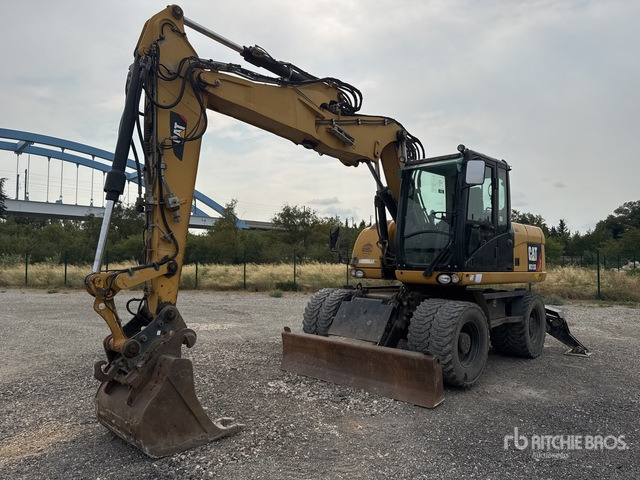 2012 Cat M313D Pelle Sur Pneus Wheel Excavator - Excavadora de ruedas: foto 1 2012 Cat M313D Pelle Sur Pneus Wheel Excavator - Excavadora de ruedas: foto 1