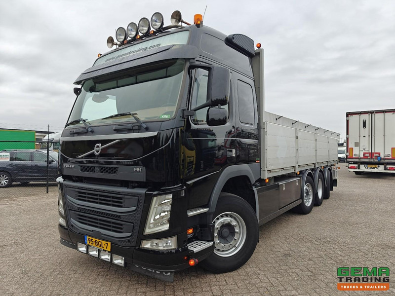 Volvo FM500 8x2/6 Globetrotter Euro6B - Open Laadbak 7.3M - HH Vloer - Alu Zijborden - Stuur/LiftAssen - Camión caja abierta: foto 1 Volvo FM500 8x2/6 Globetrotter Euro6B - Open Laadbak 7.3M - HH Vloer - Alu Zijborden - Stuur/LiftAssen - Camión caja abierta: foto 1