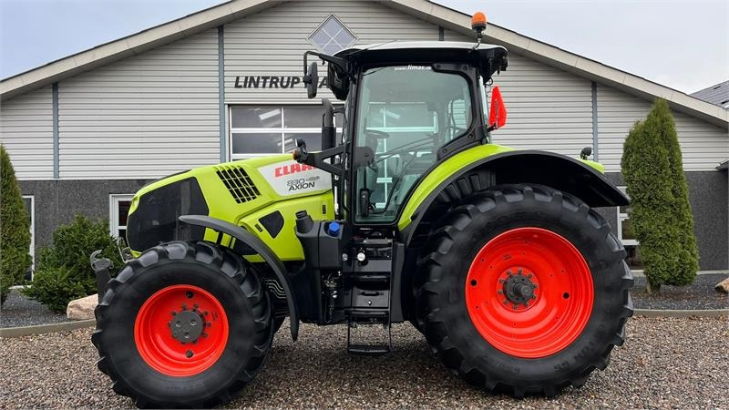 Claas Axion 830 Med frontlift. Velholdt traktor. - Tractor: foto 1 Claas Axion 830 Med frontlift. Velholdt traktor. - Tractor: foto 1