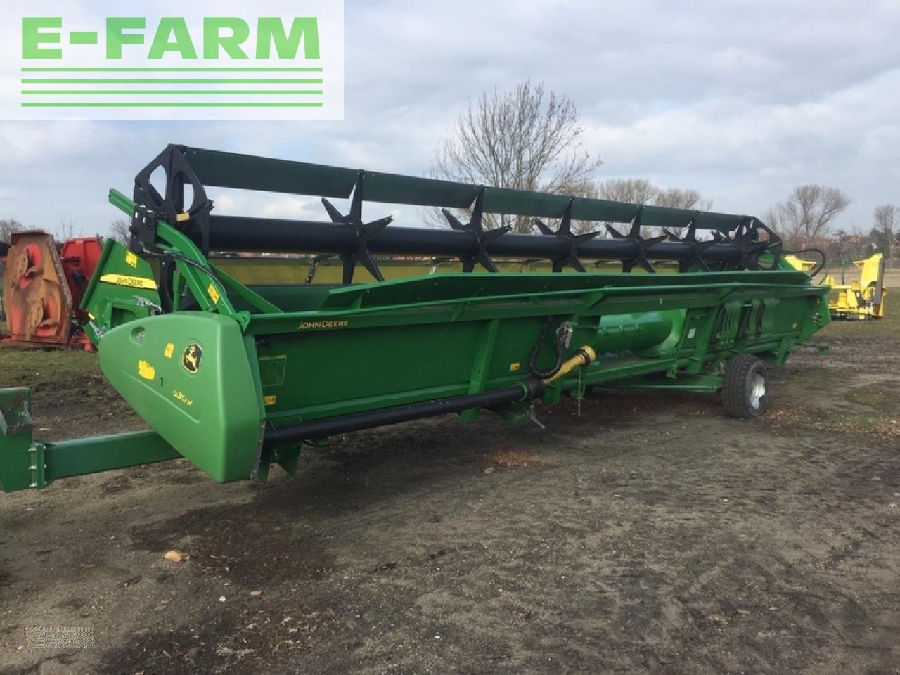 John Deere 630r mit sonnenblumenvorsatz - Tractor: foto 2 John Deere 630r mit sonnenblumenvorsatz - Tractor: foto 2
