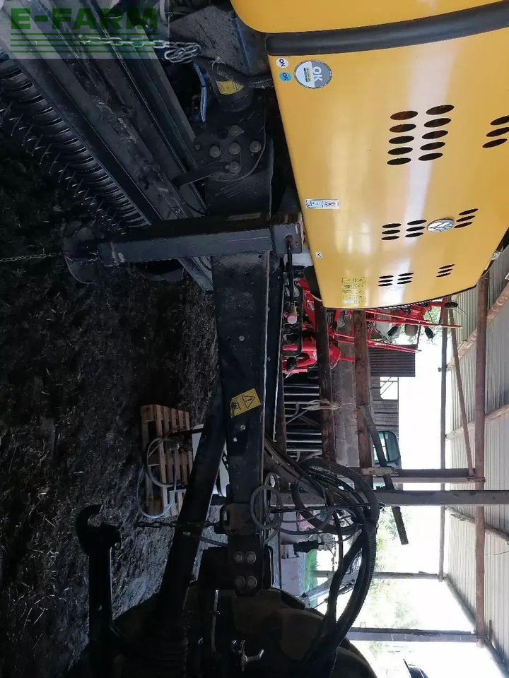 Empacadora de pacas cuadradas New Holland roll belt 150 superfeed: foto 7 Empacadora de pacas cuadradas New Holland roll belt 150 superfeed: foto 7