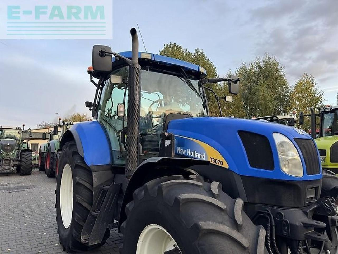 Tractor New Holland t6070 powercommand: foto 23 Tractor New Holland t6070 powercommand: foto 23