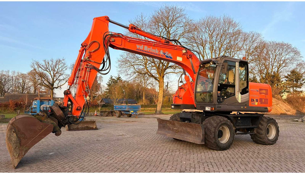 2009 HITACHI ZX140W-3 WHEELED EXCAVATOR - Excavadora de ruedas: foto 1 2009 HITACHI ZX140W-3 WHEELED EXCAVATOR - Excavadora de ruedas: foto 1
