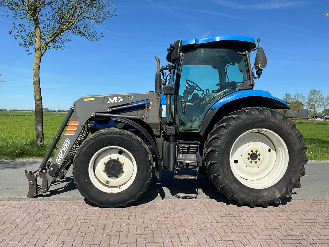 New Holland TS100A - Tractor: foto 5 New Holland TS100A - Tractor: foto 5