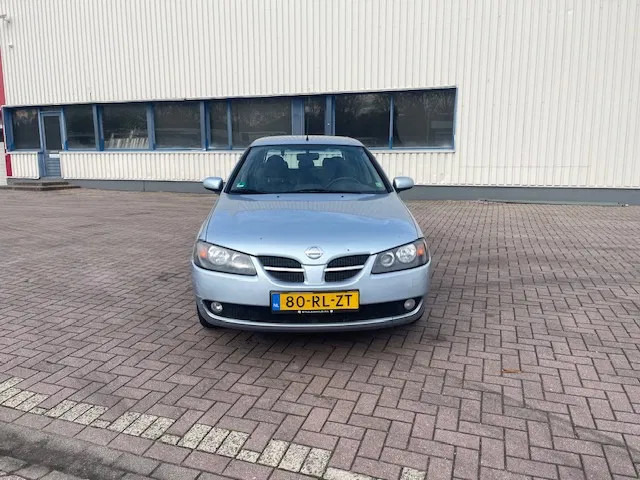 Nissan Almera Leder bekleding APK Cruise control - Hatchback: foto 2 Nissan Almera Leder bekleding APK Cruise control - Hatchback: foto 2